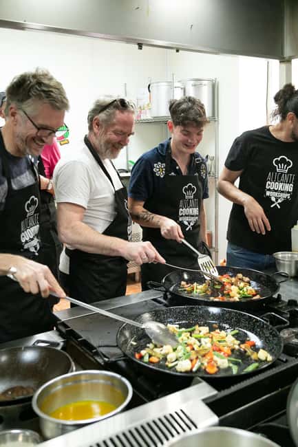 Alicante: Paella & Sangria Class with Tapas and Market Visit - The working kitchen setup: where the class turns into real cooking