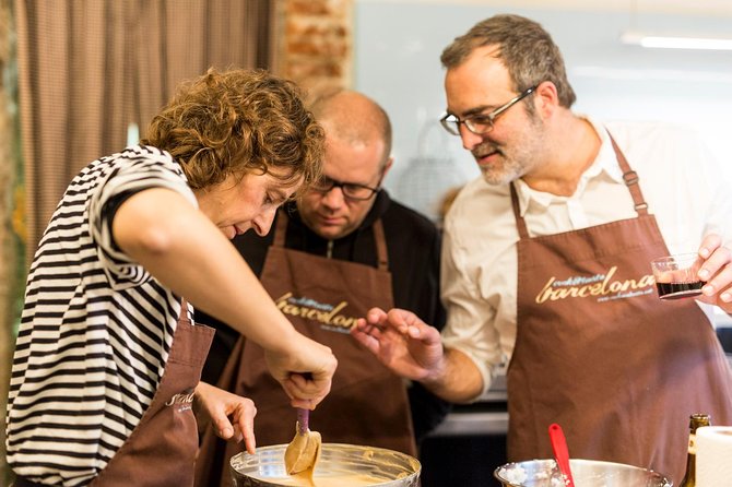 Barcelona Culinary Experience: Paella & Tapas Cooking Class - Entering The Cook&Taste Kitchen in Ciutat Vella