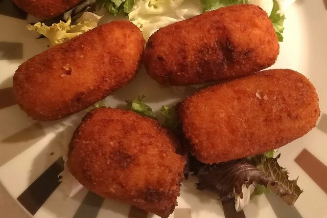Barcelona Food Tour: Tapas, Drinks and Delights with a Local - Plaça de Sant Jaume: Catalan dessert icons, from crema catalana to turrón-style ice cream