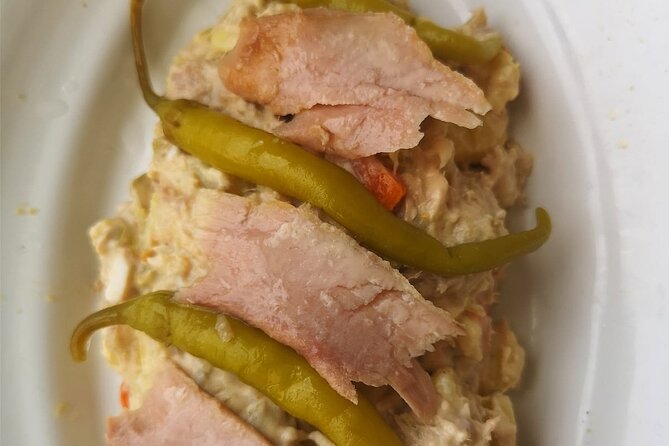 Barcelona Food Tour: Tapas, Drinks and Delights with a Local - Carrer del Regomir: pan con tomate, pimientos del padrón, and cava