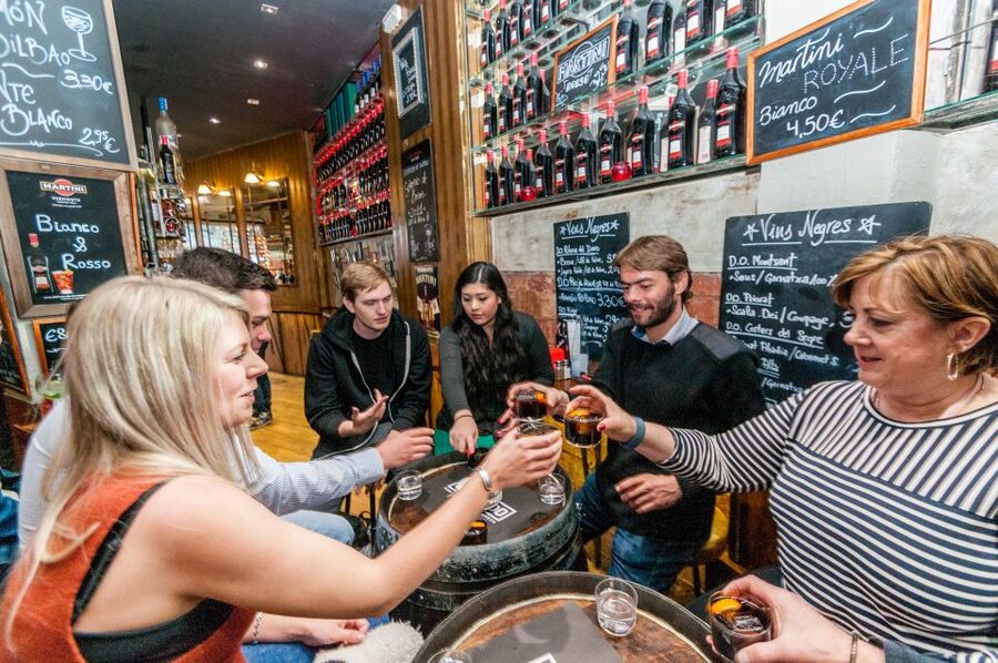 Barcelona Gourmet Food & Wine Tour with Local Expert - The music bar stop: comfort food in a lively Eixample watering hole