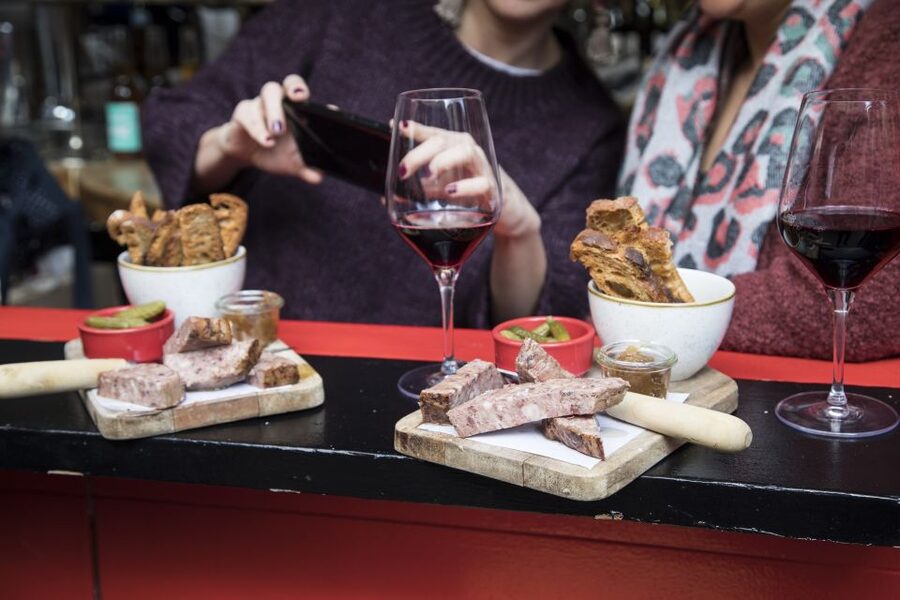 Barcelona Gourmet Food & Wine Tour with Local Expert - The first tasting stop: four tapas and local wine at a modern taberna