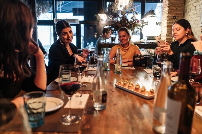 Barcelona: Guided Food Walking Tour with Tapas and Wine - Where the Tour Starts: Plaça de Correus and the Gothic Quarter Mood