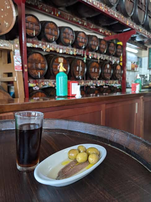 Barcelona: Hidden Bars and Authentic Tapas Journey - What you eat: charcuterie, cheese, seafood, and seasonal tapas