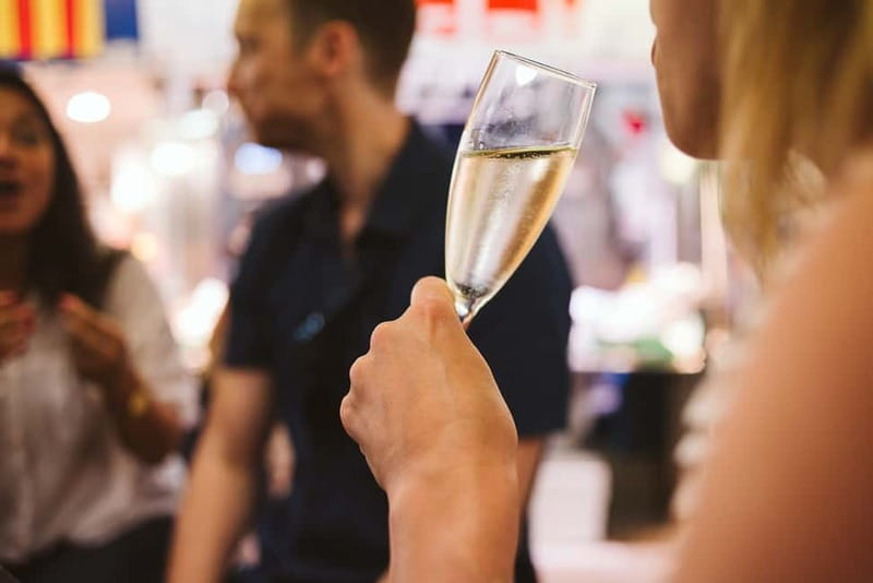 Barcelona: Hidden Markets, Tapas & Paella Food Tour - Bodega La Peninsular and the bomba tapa in Barceloneta