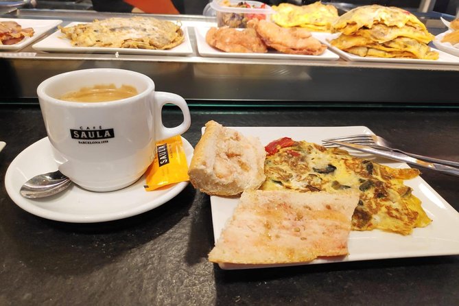 Barcelona Morning Tapas Crawl by Food Tour - Finding Pl. de Catalunya 16S: starting right at the city’s crossroads