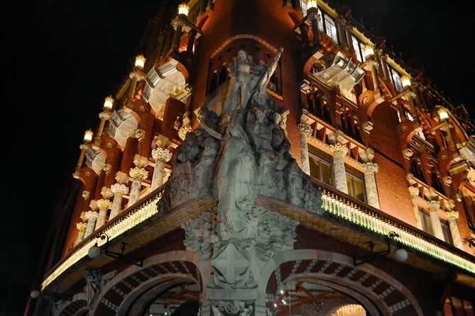 Barcelona Night Bike Tour with Local Tapas and Cava Stop - Placa d’Espanya: steps up, city views, and cava in hand
