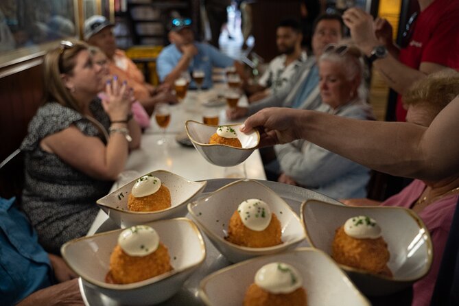 Barcelona Old Town Tapas Tour: Vermouth, Bites & Hidden Gems - City Hall moments and a surprise local sweet