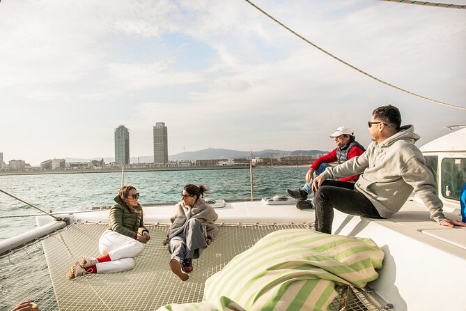Barcelona: Premium Private Wine Tasting & Tapas in a Catamaran - Mediterranean sailing: nets, skyline highlights, and a possible swim
