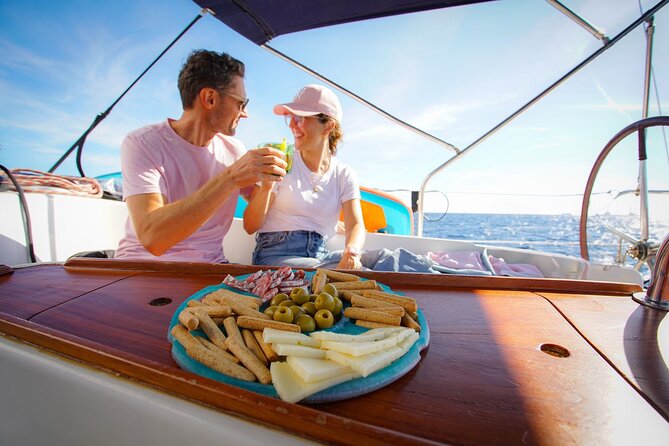 Barcelona Sailing Experience: Spanish Tapas and Premium Open Bar - Swimming and sun time: bring your gear, but match your expectations