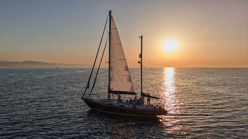 Barcelona: Sailing on a Classic Ketch Boat with tapas & cava - Swimming and paddle boarding time when conditions allow