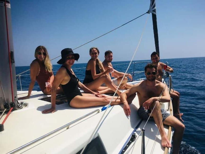 Barcelona: Sailing Tour with Tapas, Drinks and Swim Stop - Meeting at Port Vell: the No Limits boat and quick check-in