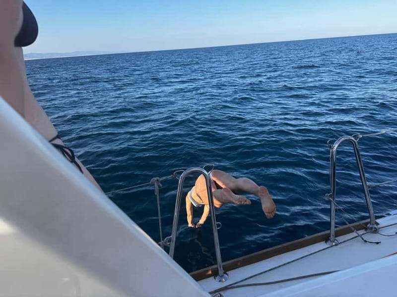Barcelona: Sailing Tour with Tapas, Drinks and Swim Stop - The swim stop in the Mediterranean: weather permitting, but plan for cool water
