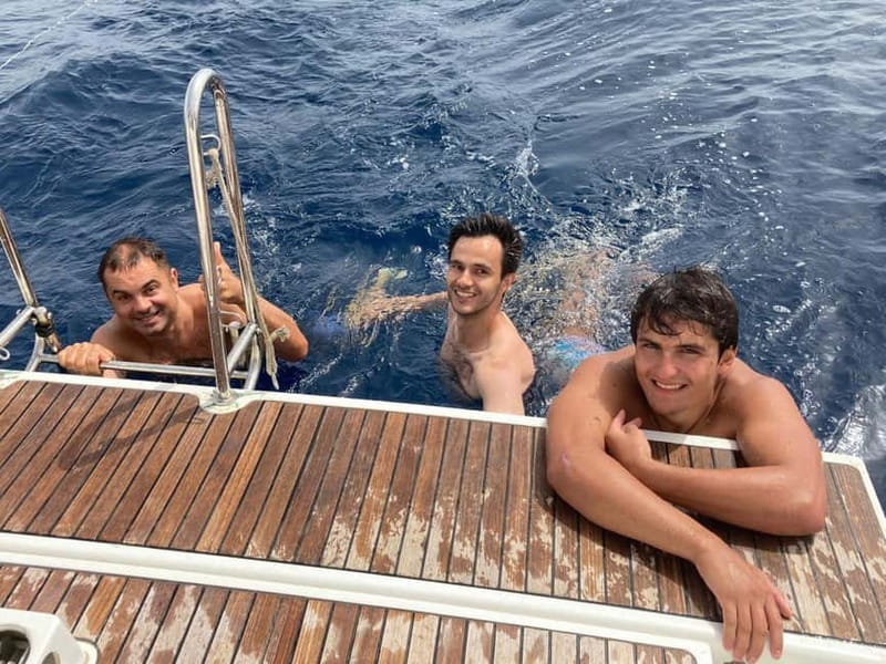 Barcelona: Sailing Tour with Tapas, Drinks and Swim Stop - Sailing out past Barceloneta and the America’s Cup harbor
