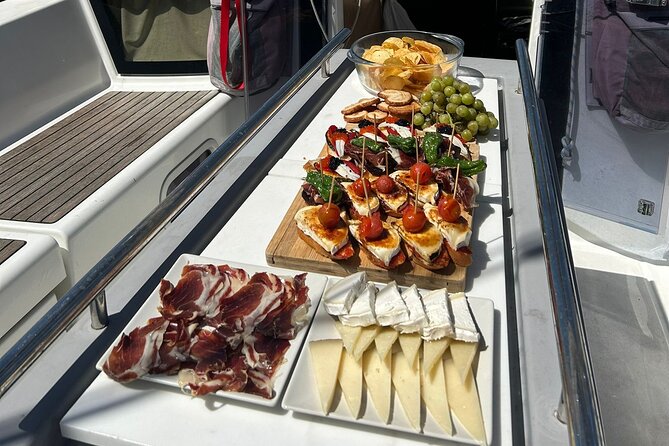 Barcelona: Sailing Tour with Tapas, Drinks, Swim & Sunset Option - Sunset option: golden-hour sailing and why timing matters
