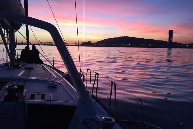 Barcelona: Sailing Tour with Tapas, Drinks, Swim & Sunset Option - Onboard vibe: cava, seafood tapas, and hosts who keep things moving
