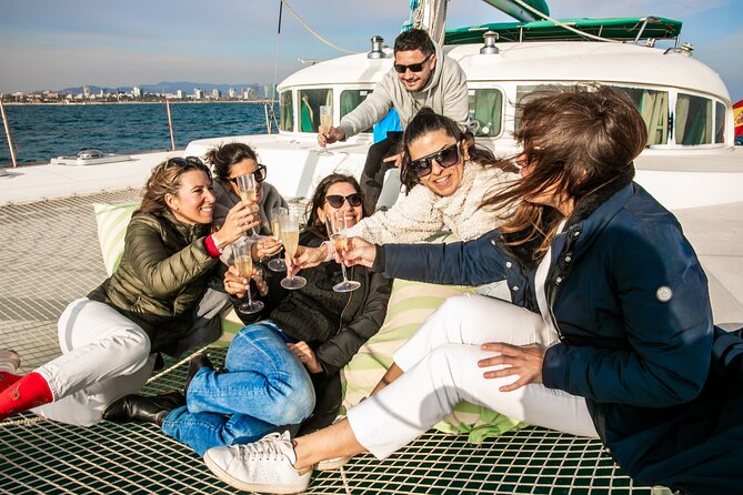 Barcelona Small Group Trip by Catamaran w Tapas, Cava and Sunset - Port Vell: Calm Old-Port Sailing and the Tapas + Cava Toast