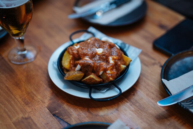 Barcelona Tapas Food Walking Tour with Wine in El Born - Entering Plaça de Correus: where the night starts