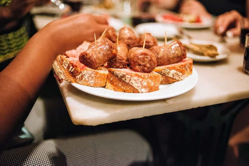 Barcelona: Tapas, Wine & History Tour of the Old Town - Gothic Quarter history walk: Roman fragments to 20th-century change