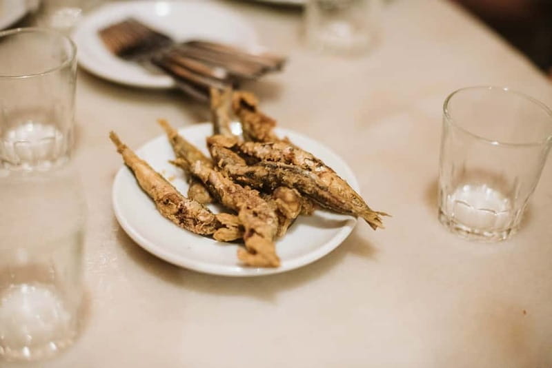 Barcelona: Tapas, Wine & History Tour of the Old Town - Shared plates with local red wine: an early 20th-century tapas finish