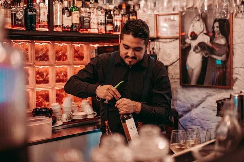 Barcelona: Tipsy Tapas & History Tour in the Gothic Quarter - The second bar: more tapas variety, more Catalan-night energy