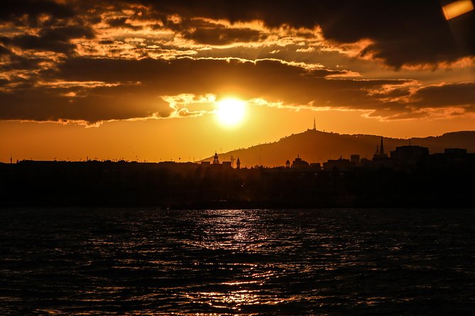 Barcelona Unique Sunset Sailing Experience with Tapas & Open Bar - Live Music Upgrade: Sax or Guitar Turns the Mood Up