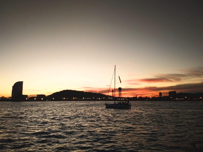 Barcelona: Unique Sunset Sailing Tour with Tapas & Open Bar - Open bar on the water: drinks, pacing, and expectations