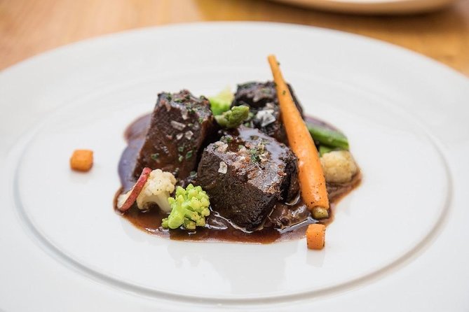 Barcelona Wine and Gourmet Tapas Tour - Price and value: $157.28 for four hours, with a real ticket included