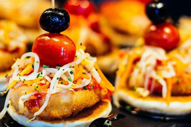 Barcelona With Locals: Wine and Tapas Private Tour - A private wine-and-tapas night with Barcelona people, not just places