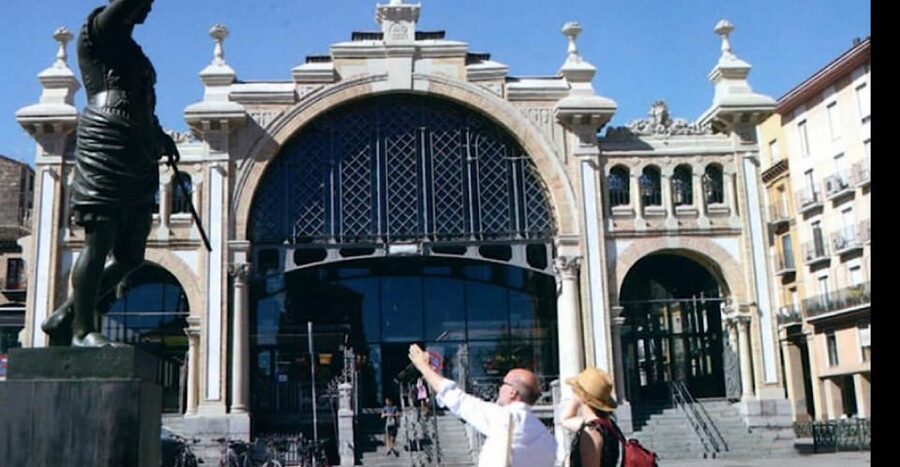 Discover Zaragoza: Complete tour + wine and tapas - Roman Wall and the Old Market: layers of everyday Zaragoza