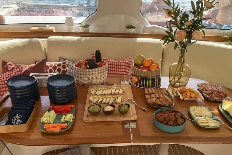 From Palma: Luxury Catamaran Group Tour with Tapas & Drinks - The 4-hour sailing stretch: views + good music + space