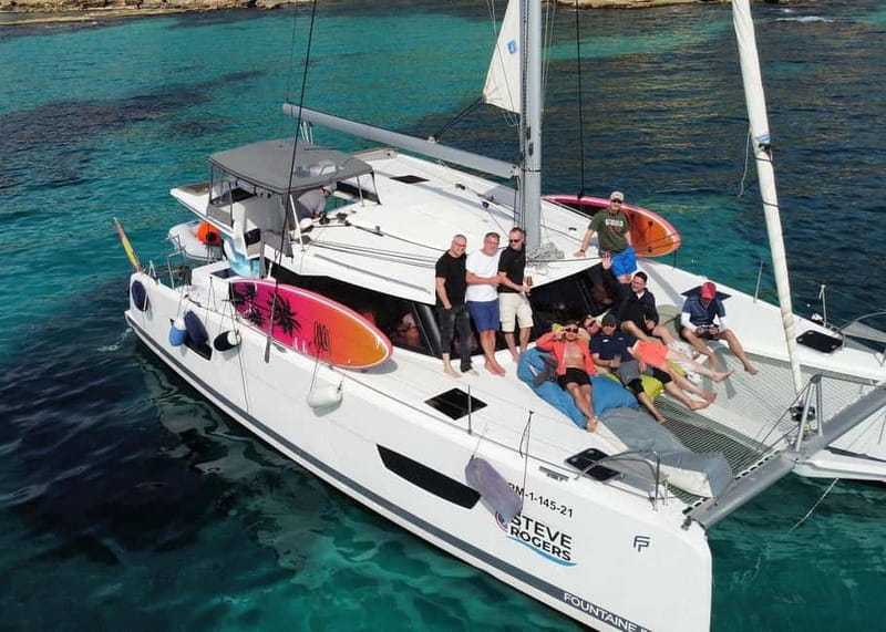 From Palma: Luxury Catamaran Group Tour with Tapas & Drinks - Tapas on board: a fun break, not a full meal