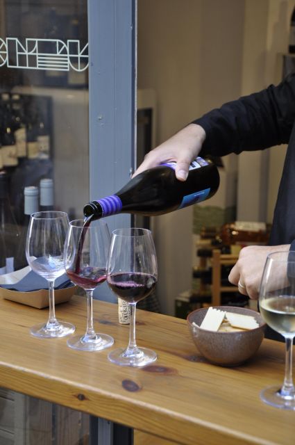 Girona Evening Food Tour & Tapas Bar Experience - Stop-by-stop: from Plaza de la Independencia to Carrer de Santa Clara