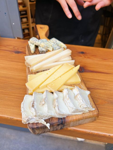 Girona Evening Food Tour & Tapas Bar Experience - Squares that explain the city: Rambla de la Llibertat and Plaça dels Raïms