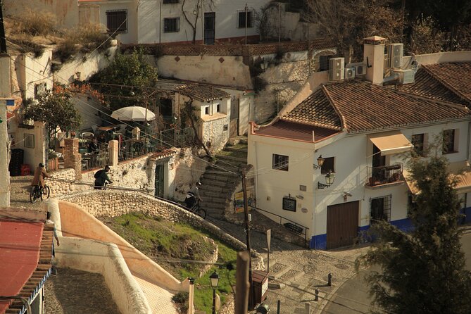 Granada Highlights Tour with Tapas Breaks by Electric Bike - Granada’s Old Center Moves: Square, Streets, and River Views
