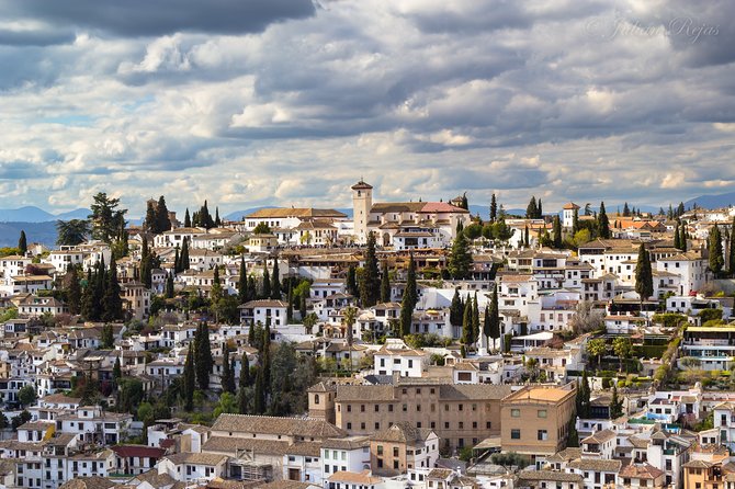 Granada Tapas Trail & Gypsy Flamenco Show - Albaicín walking and the next bite on whitewashed streets