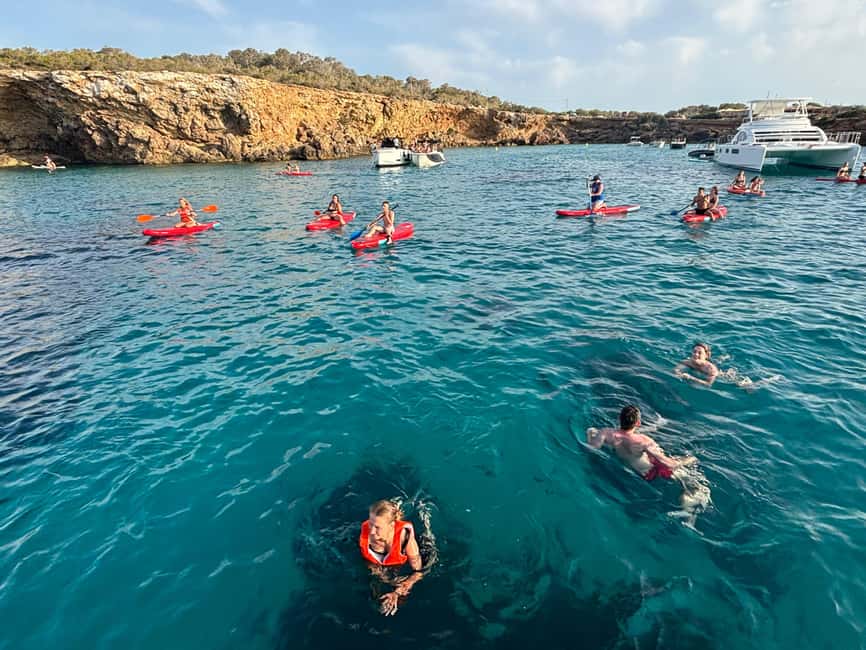 Ibiza: Sunset Boat Tour with Water Sports, Open Bar & Tapas - Entering The Boat Scene at Sant Antoni Port (Hut Nº2)