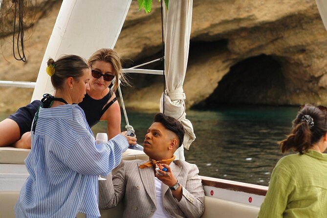 Ibiza Sunset Boat Trip Tapas and Open Bar - The Vibe on Board: Friendly Crew, Music, and a Group That Changes the Mood