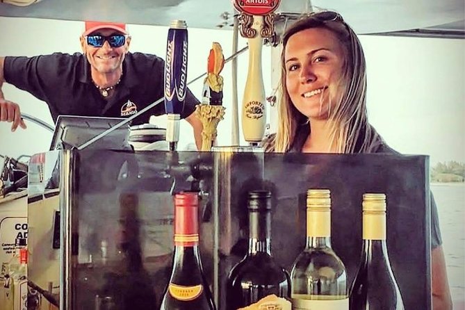 Key West Sunset Sail: Dolphin Watching, Wine, and Tapas - Mallory Square, Fort Zachary Taylor, Sunset Key: Why These Stops Matter