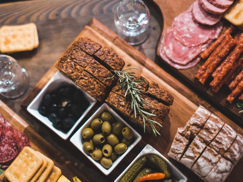 Krakow: Vodka Tasting Tour: Tapas, Tipsy Tales & Hidden Gems - Two historic clear vodkas: the tasting that teaches the basics