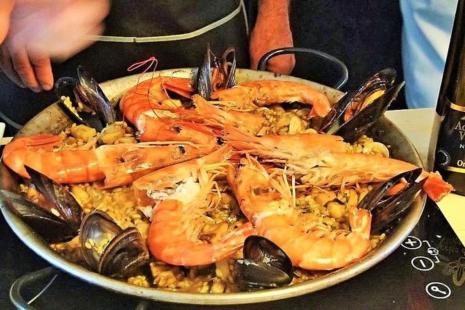 Learn The Art Of Spanish Tapas With a Local Chef in Barcelona - The Market Stop and the Old Kitchen Setting