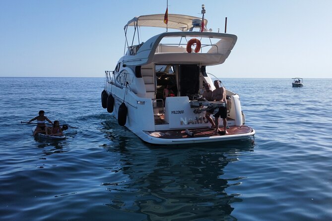 Luxury Yatch trips + Open Bar + Tapas + Paddle Surf + Snorkel - Where you meet: getting on the boat at Marina del Este