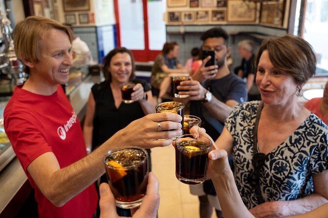 Madrid by Night: Tapas Crawl, Local Drinks & Hidden Gems - Mercado de San Miguel aperitivo: vermouth and aged cheese in a food-first market