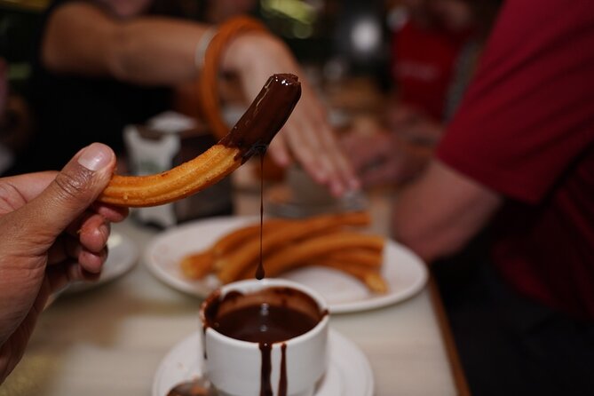 Madrid by Night: Tapas Crawl, Local Drinks & Hidden Gems - Plaza Mayor and the 1860 tavern: bocadillo de calamares plus croquettes