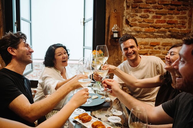 Madrid Evening Tapas and Wine Guided Tour - La Osita and the Porrón Drinking Challenge