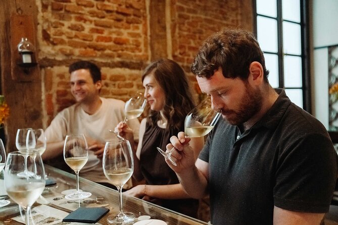 Madrid Evening Tapas and Wine Guided Tour - Muñiz: Historic Tavern Tapas and the Slow-Cooked Stew Moment