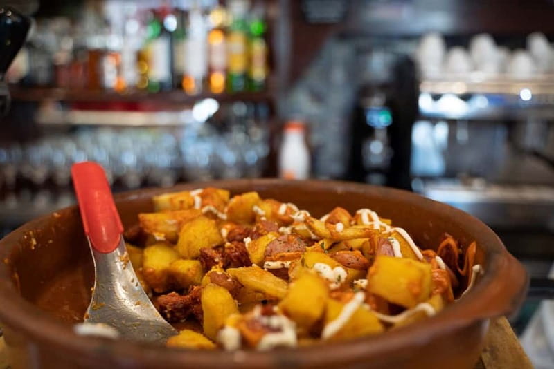 Madrid: Evening Tapas Tour with 5 Delicious Stops & Drinks - La Latina and Madroño with chorizo: where the night gets more local