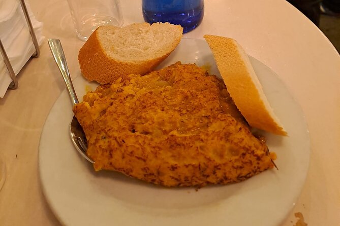 Madrid Food Tour: Tapas, Drinks and Delights with a Local - Gambas al ajillo and tortilla de patatas: the classics that set expectations