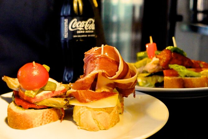 Madrid Food Tour - Tapas Walking Tour - What You’ll Eat and Drink: Iberian Meats, Pintxos, and Churros Since 1890