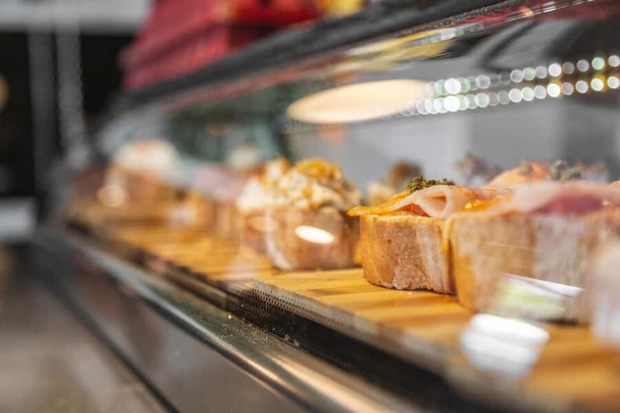 Madrid: Guided Food Tour with Authentic Tapas & Delicacies - The Tastings You’ll Actually Eat: Squid Sandwich to Manchego